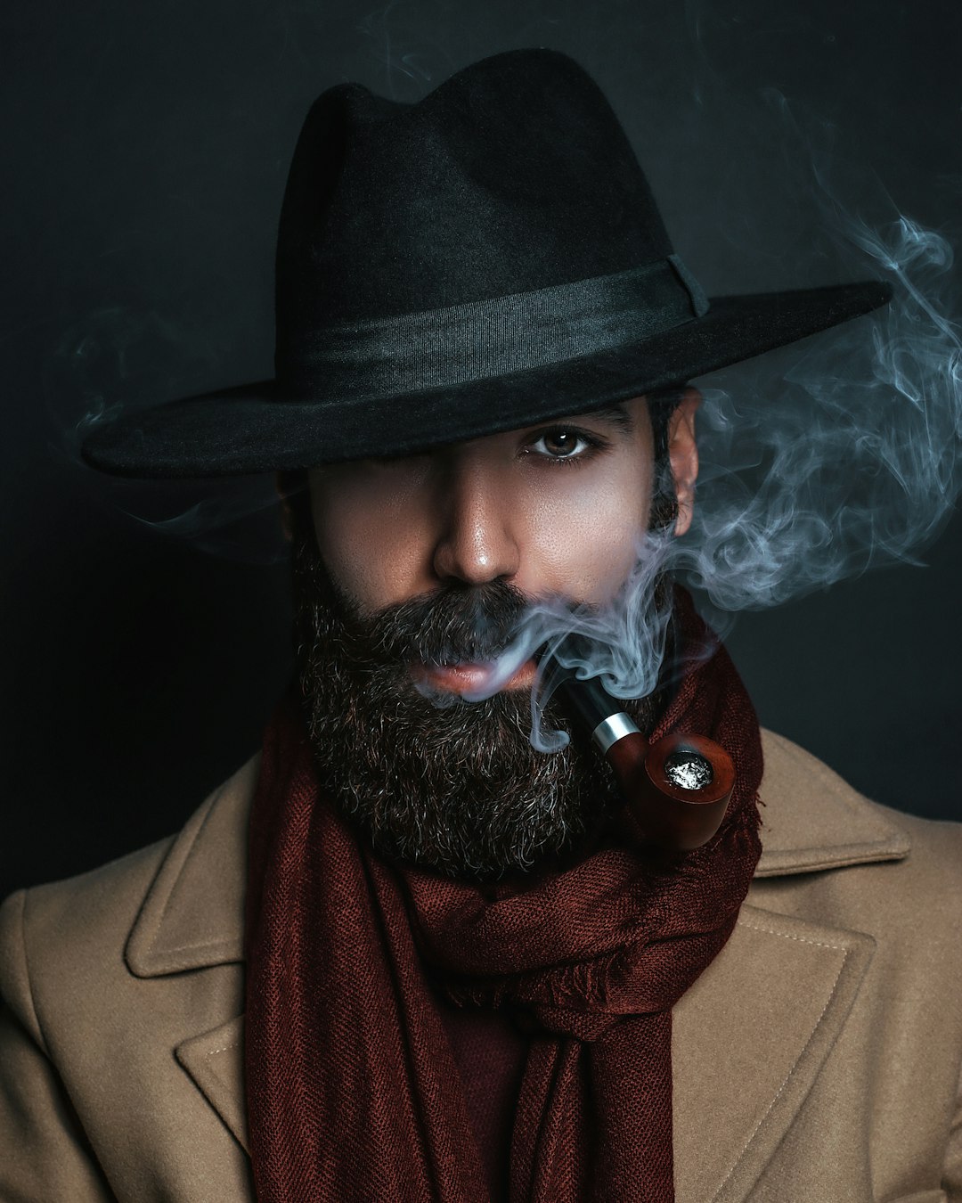 man in brown coat smoking