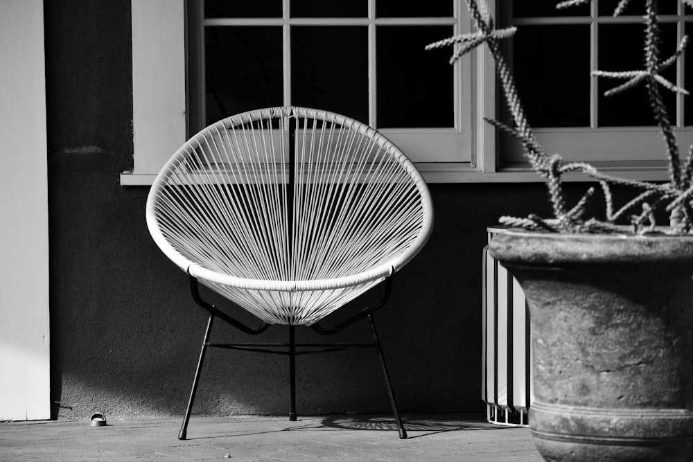 white and black basketball hoop in grayscale photography