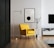 brown wooden framed yellow padded chair