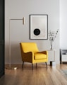 brown wooden framed yellow padded chair