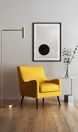 brown wooden framed yellow padded chair
