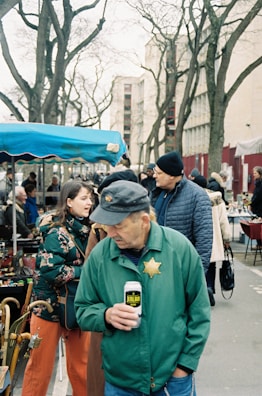 AfD Brühl representatives engaging with citizens at a local market.