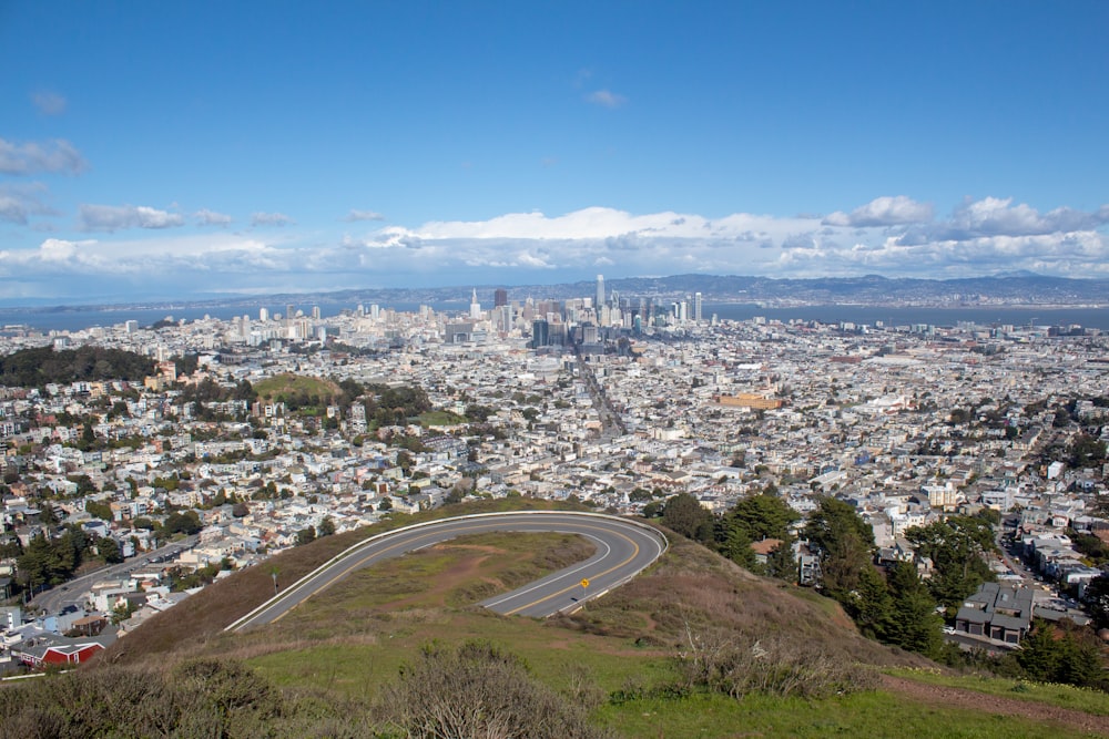 a view of a city from the top of a hill