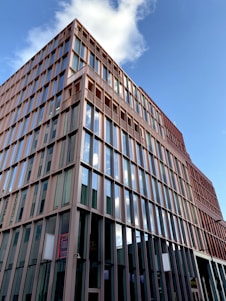 brown concrete building under blue sky during daytime