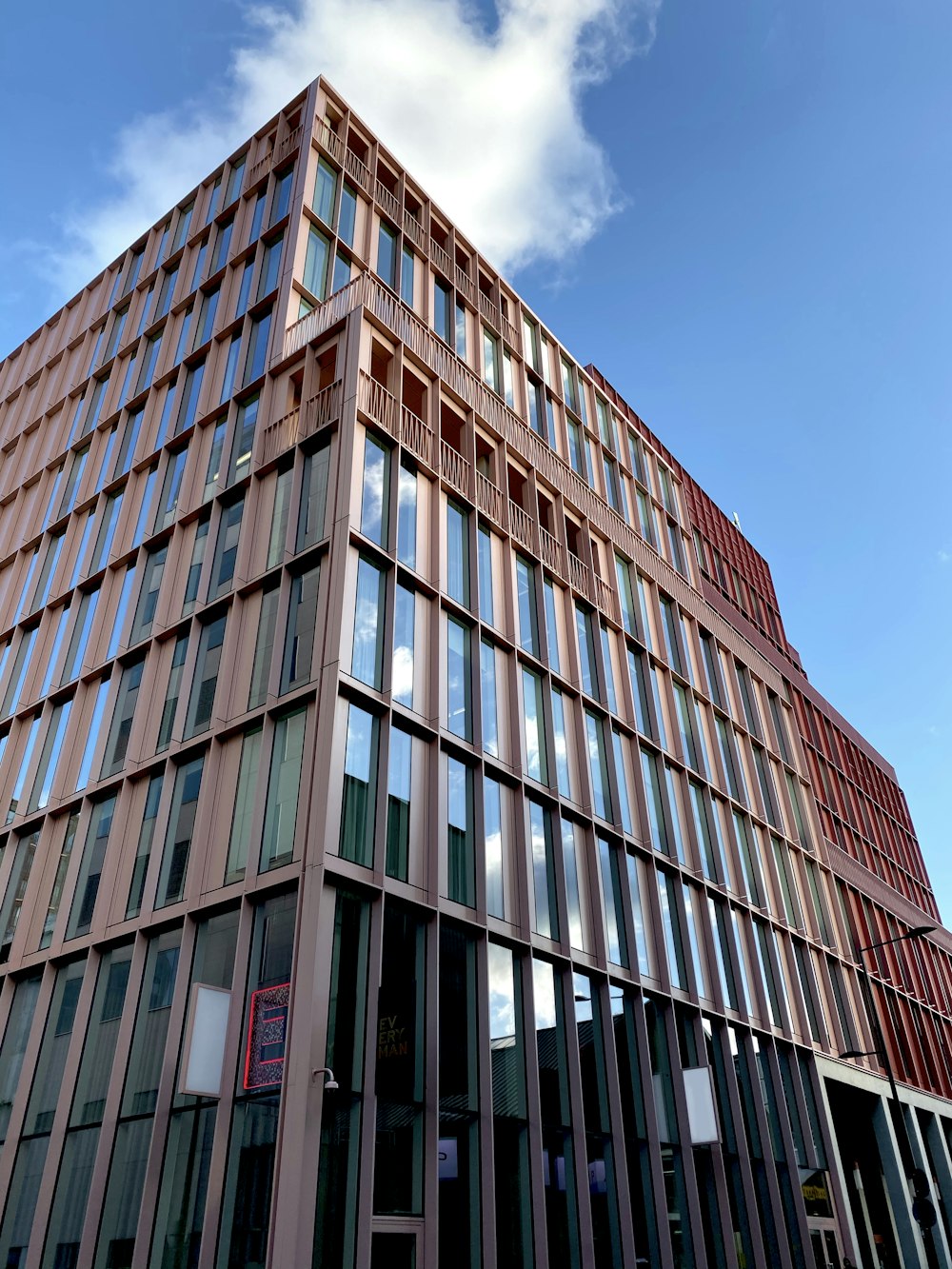 brown concrete building under blue sky during daytime