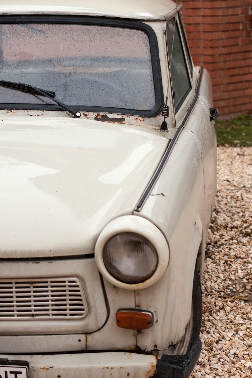 white car on brown soil