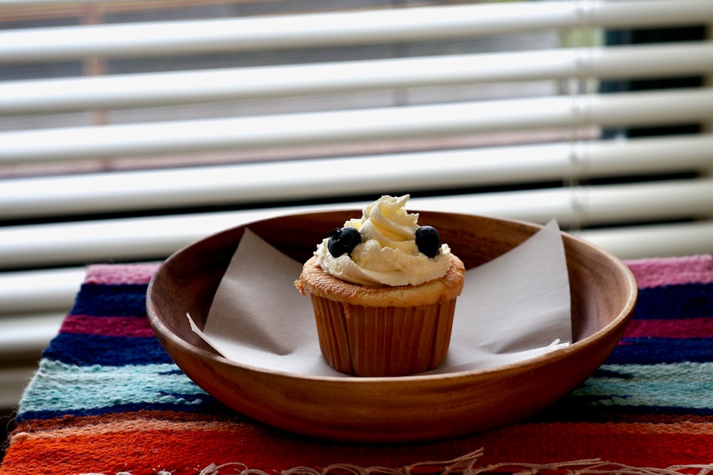 brown cupcake on brown ceramic plate