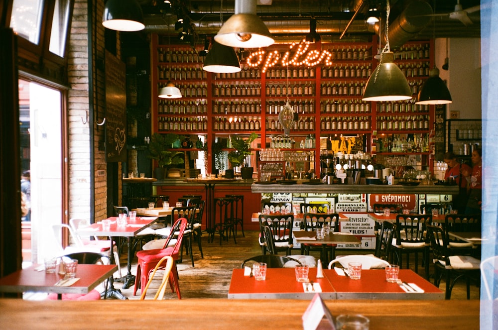 restaurant with brown wooden tables and chairs