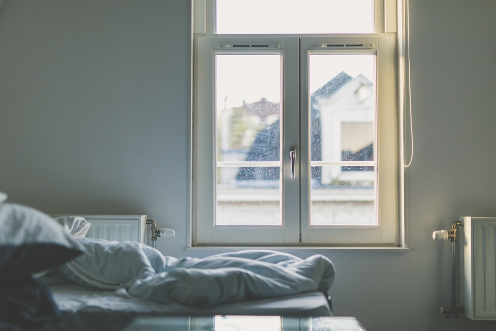 white wooden framed glass window