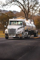 white and brown truck on road during daytime