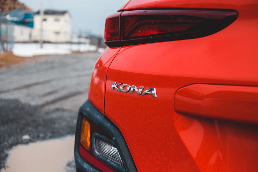 red audi car on road during daytime