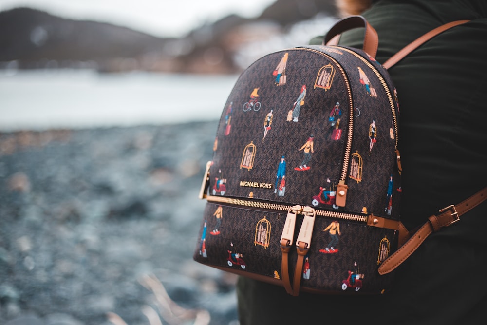 brown and black leather backpack