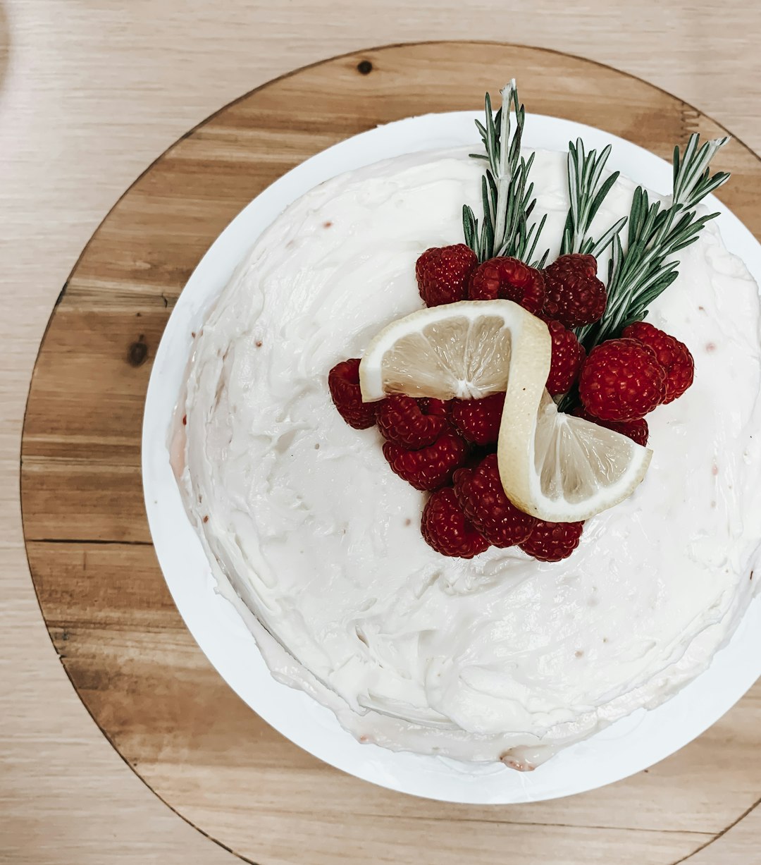 red strawberries on white ceramic plate