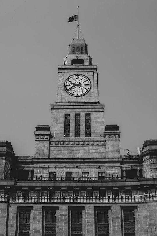 grayscale photo of big ben in Shanghai China