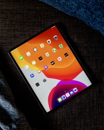 black ipad on black textile