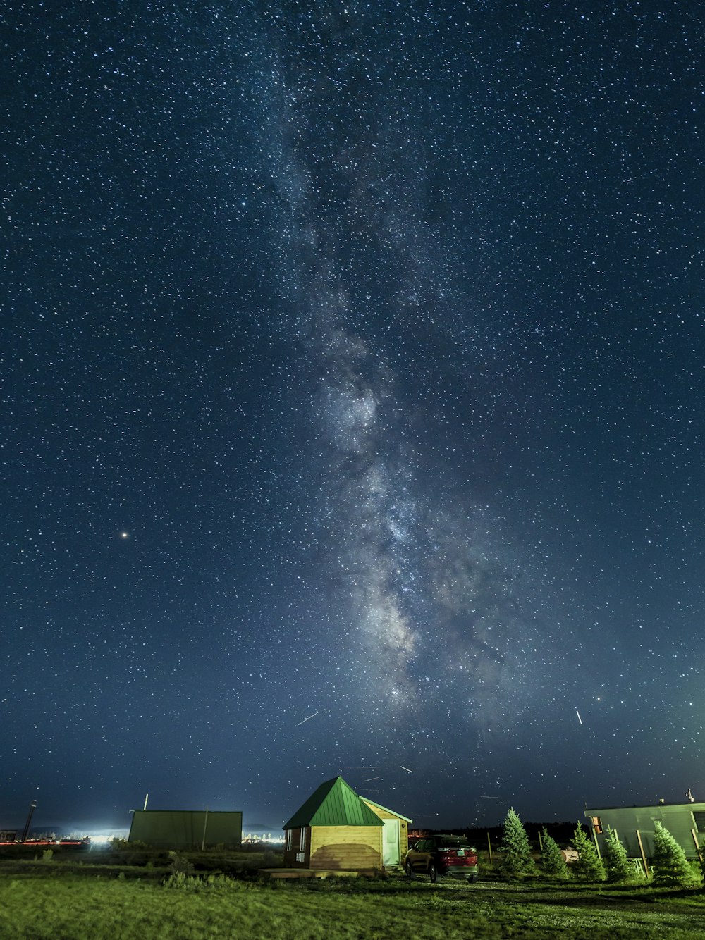 green tent under blue sky during night time