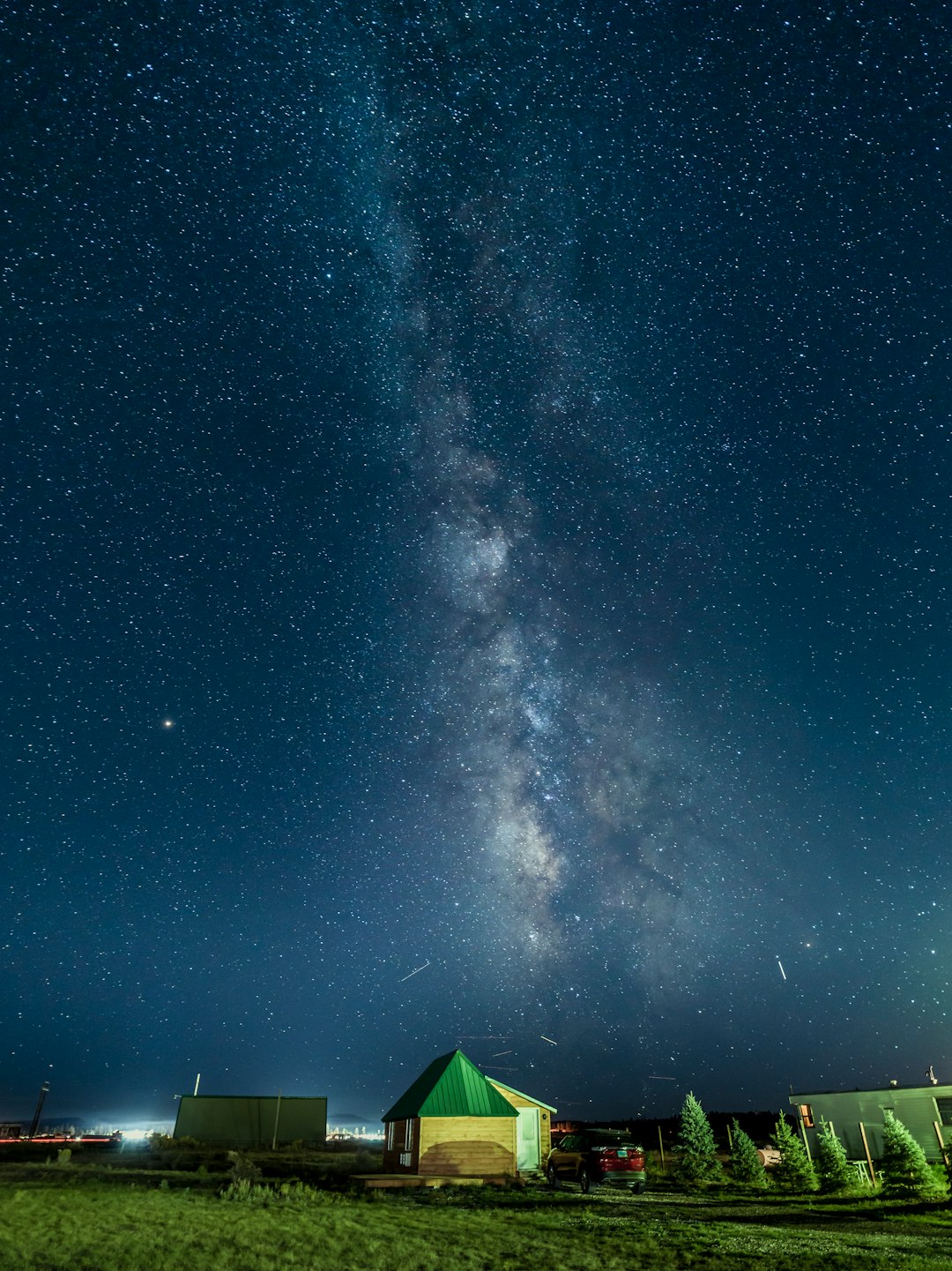 green tent under blue sky during night time