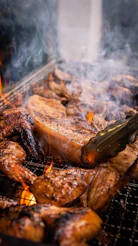 grilled meat on charcoal grill