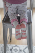 person in gray and red socks