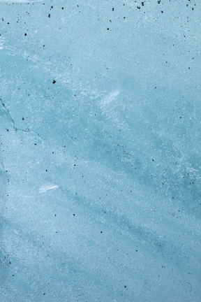 Close-up of a Nightfall garage floor epoxy Vaughan with deep navy blue tones and textured flake finish.