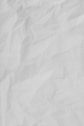 white textile on brown wooden table