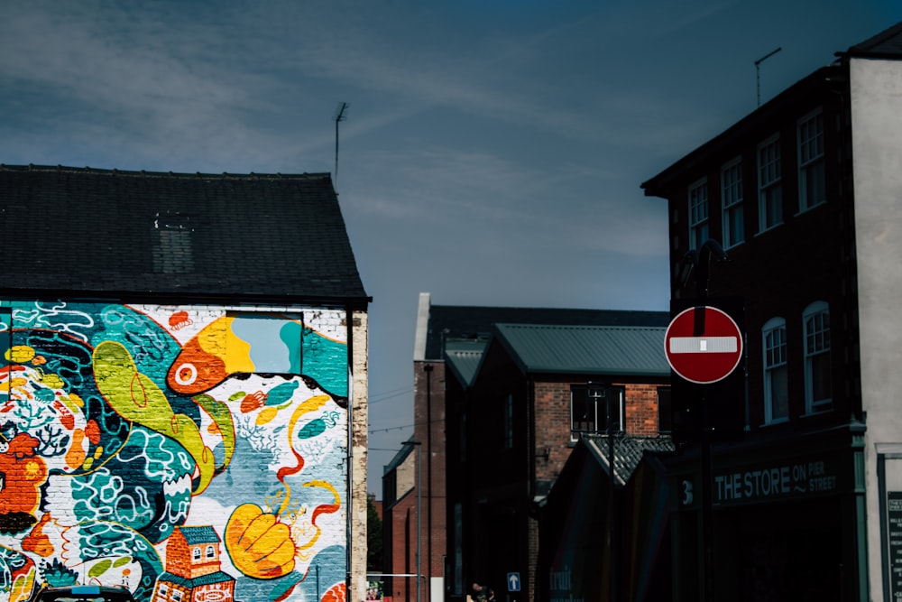 white red and yellow graffiti on wall