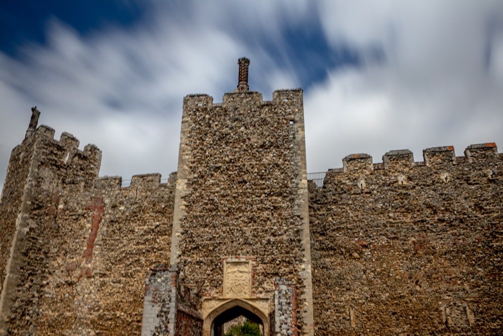 brown concrete castle under blue sky