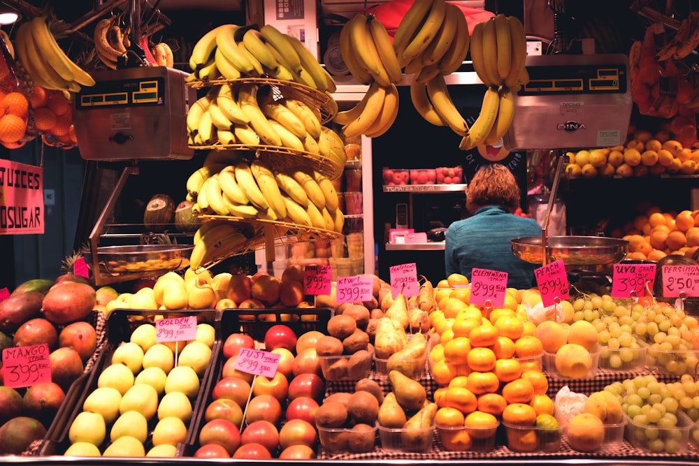 yellow banana fruit on fruit stand