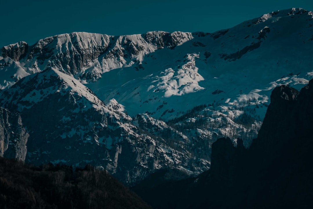 snow covered mountain during daytime