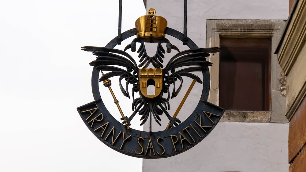 black and gold eagle logo