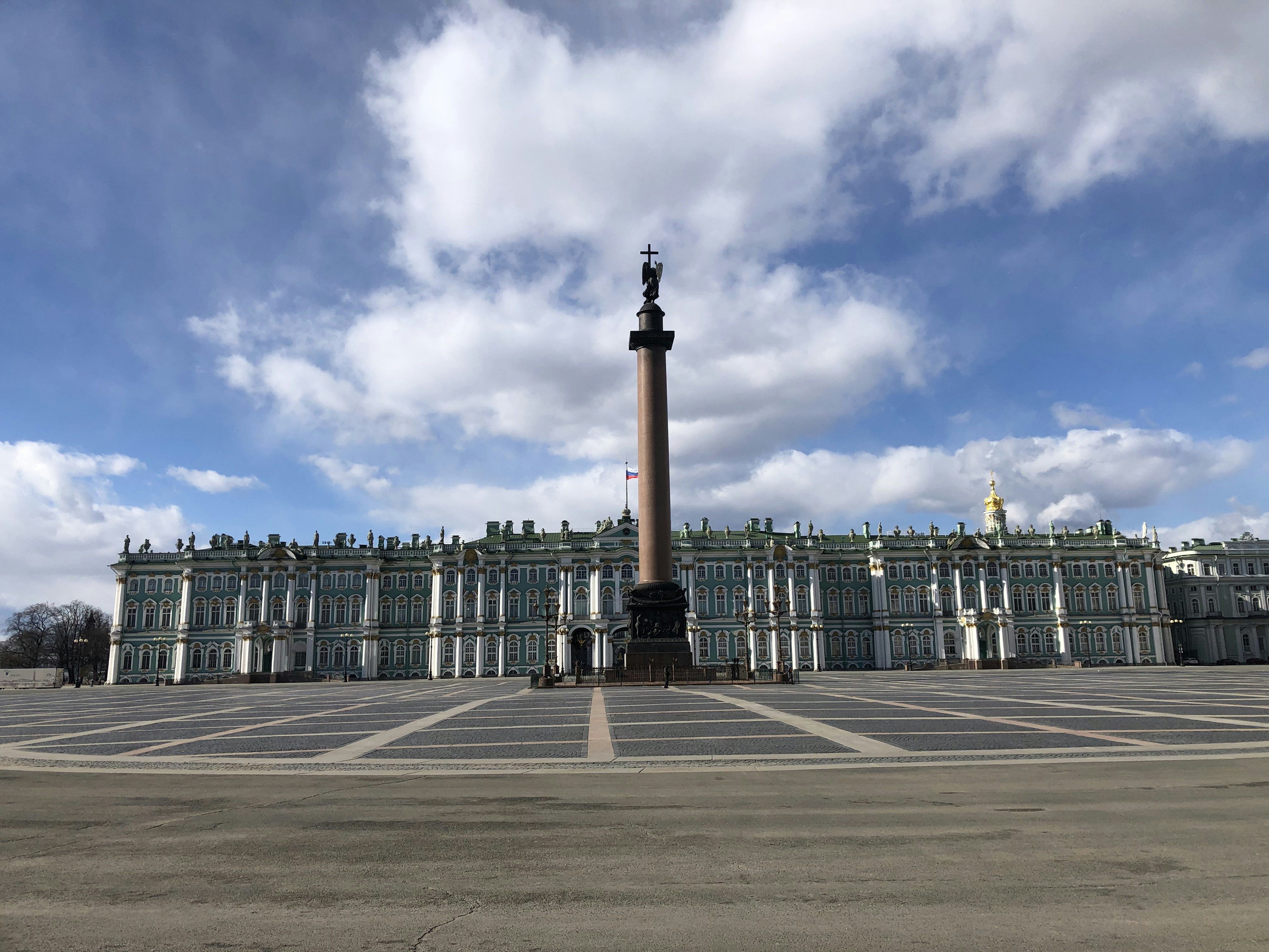 white and brown concrete building under blue sky during daytime