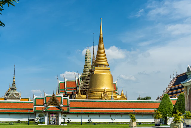 Golden chedi of Wat Phra Kaew above the palace wall