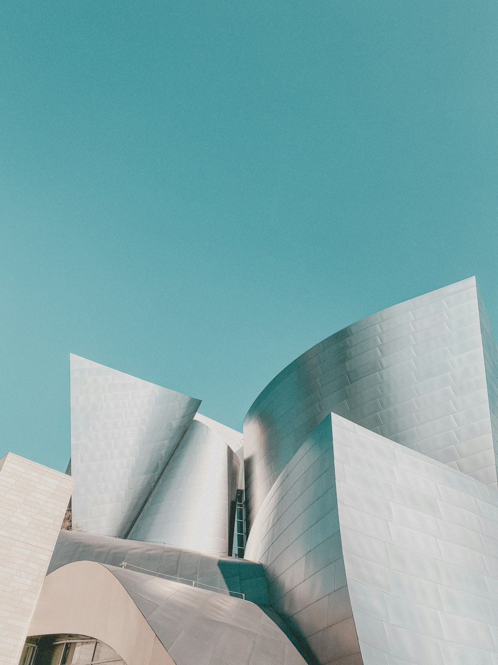 white concrete building under blue sky during daytime