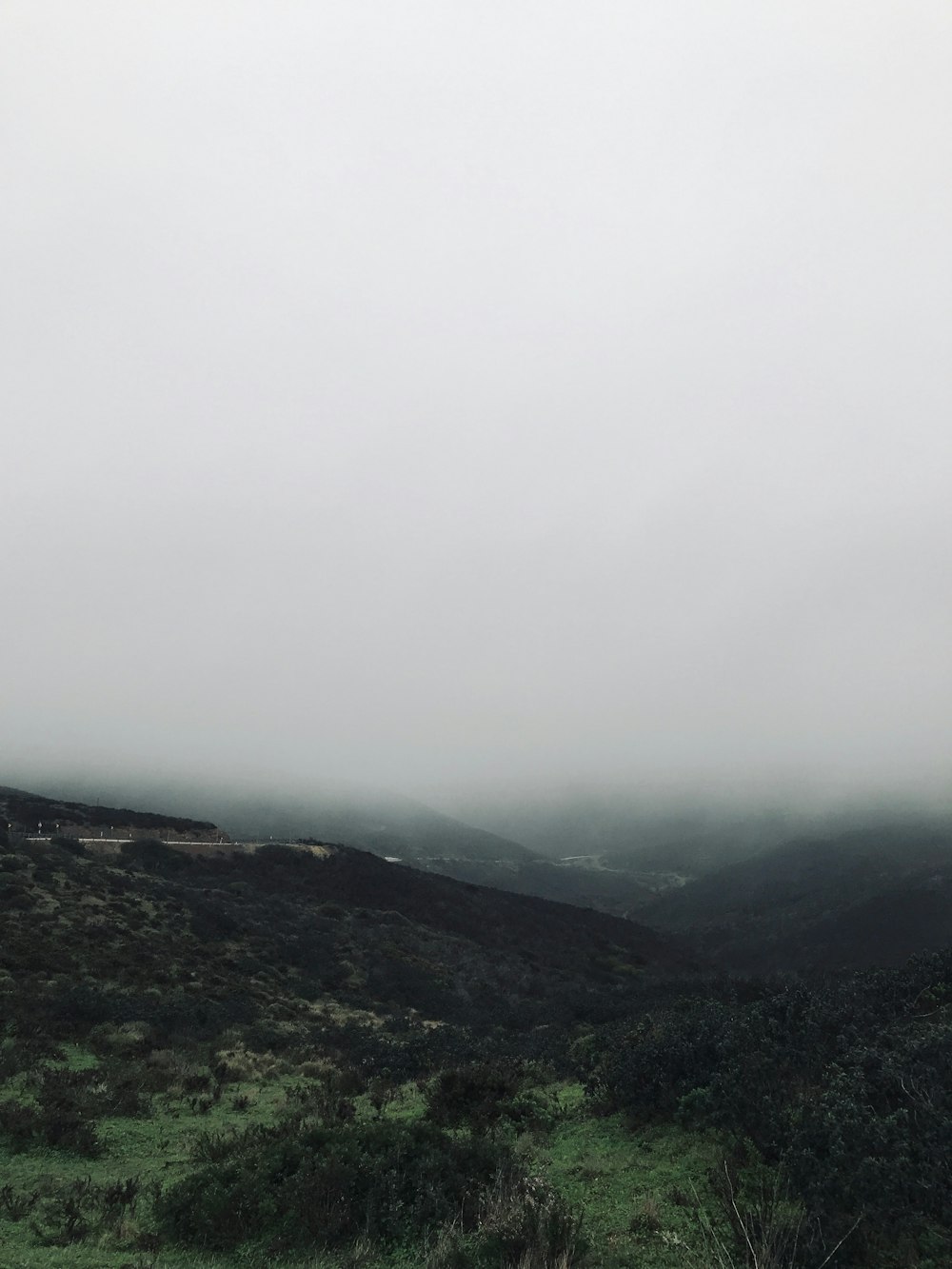 green mountains under white sky during daytime