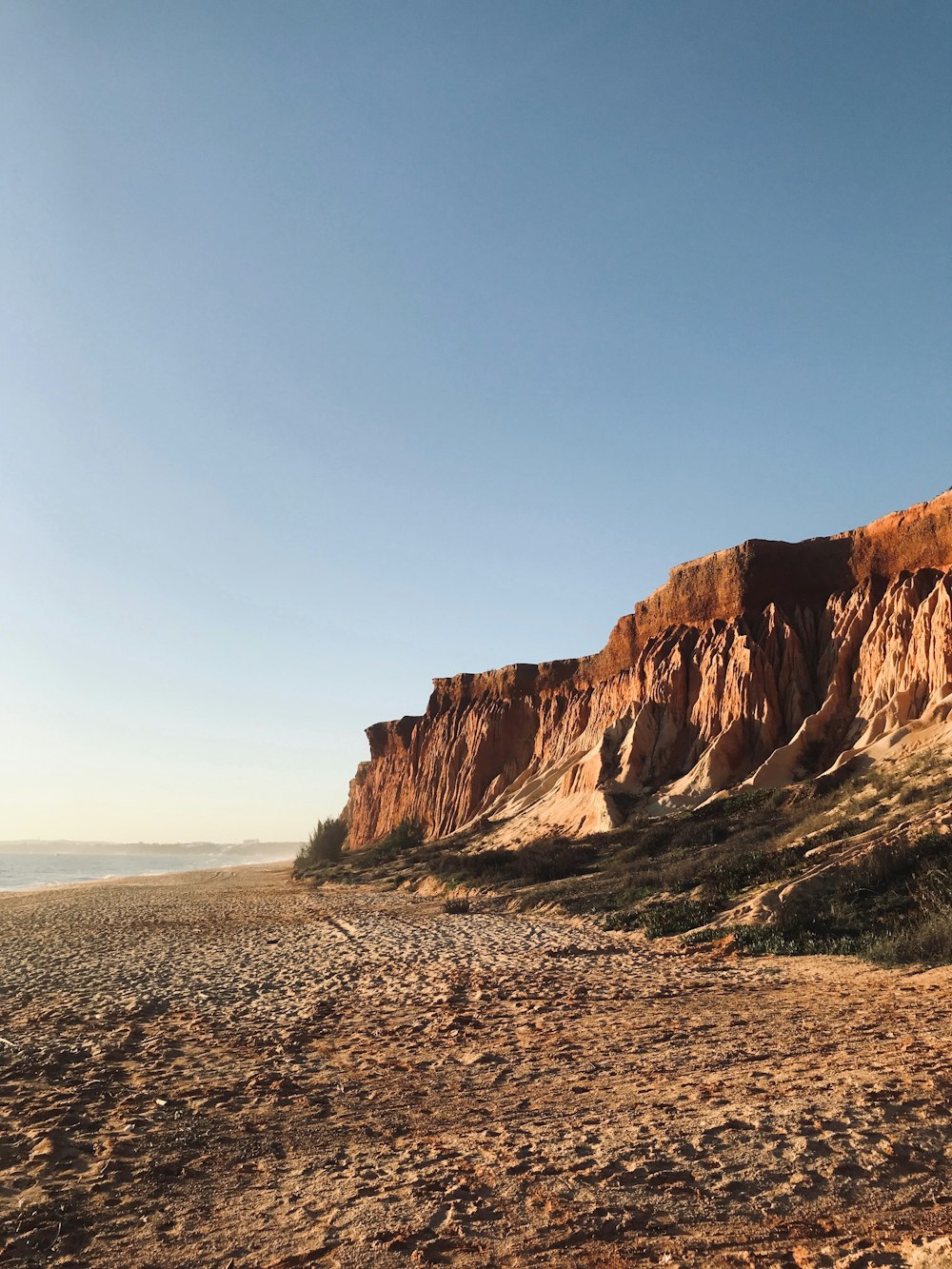 brown rock formation under blue sky during daytime