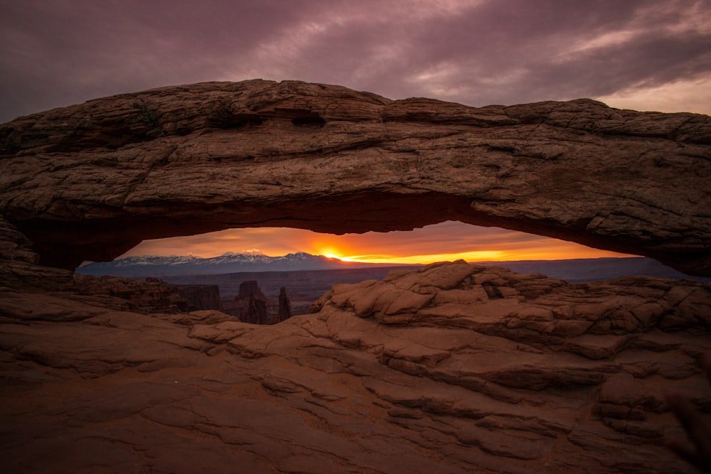 brown rocky mountain during sunset