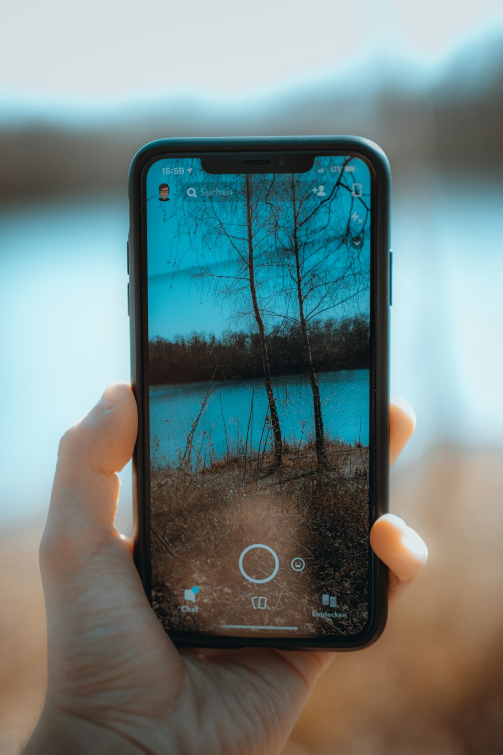 person holding black iphone 5