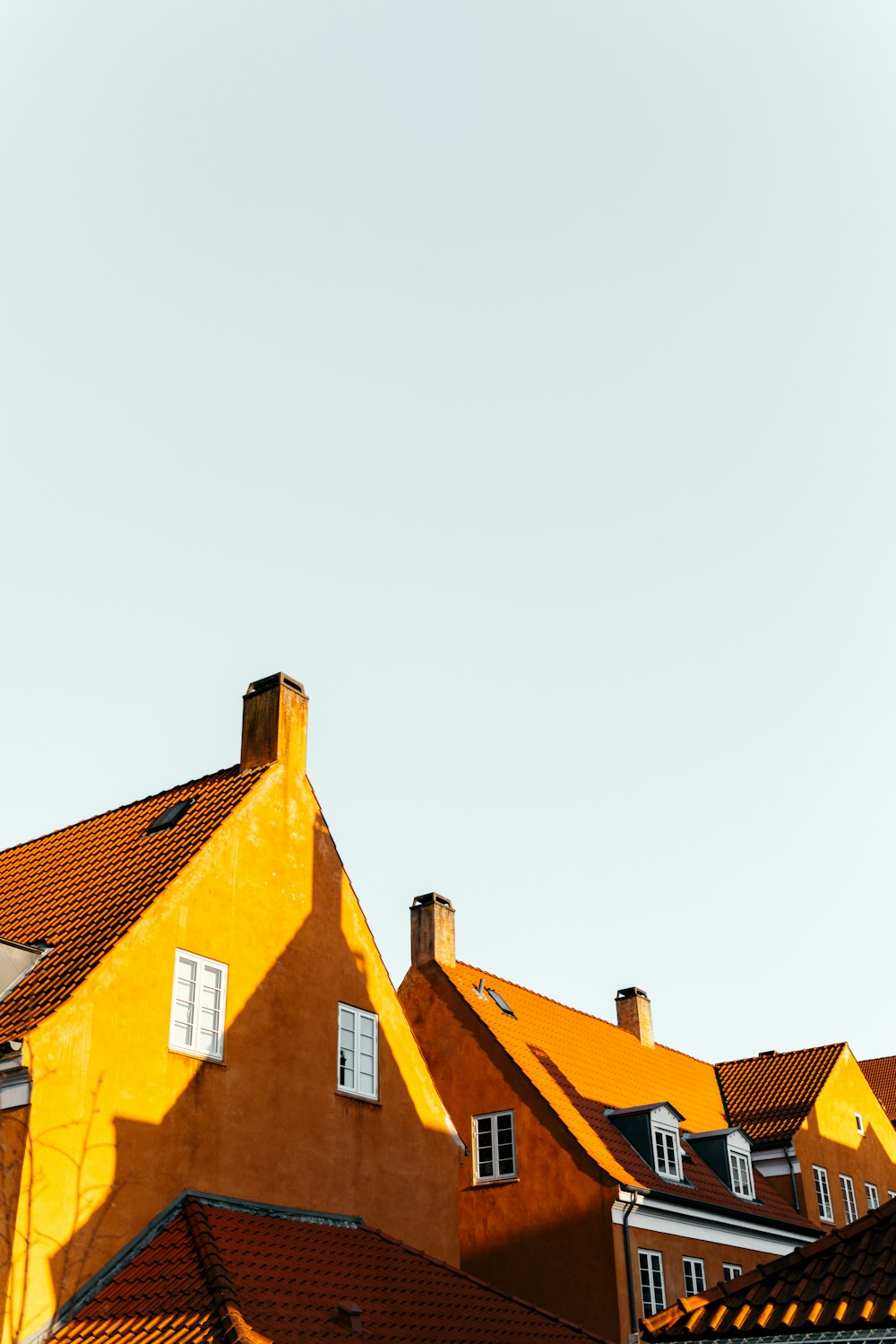 brown concrete building under white sky during daytime