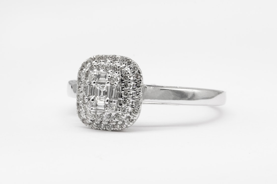 Cushion-cut diamond ring with halo on a platinum band