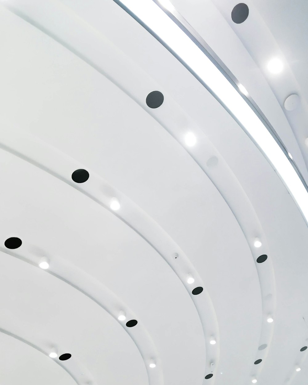 white metal frame ceiling with light