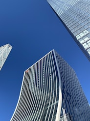 blue and white high rise building