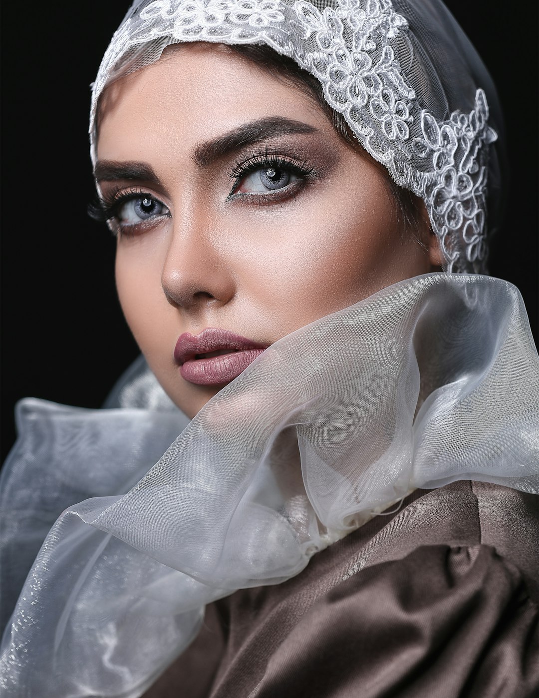 woman with white floral hijab