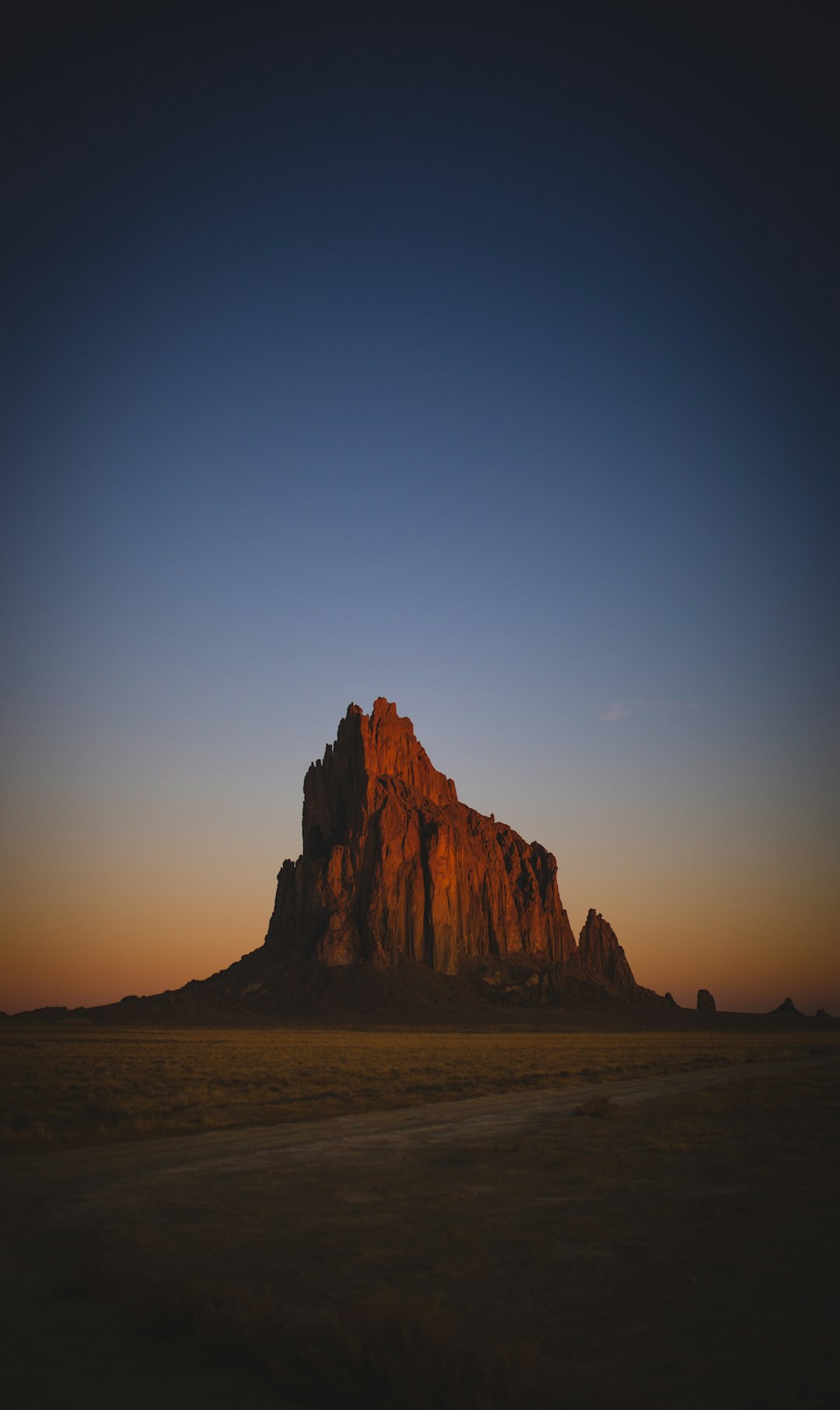 brown rock formation on sea during daytime