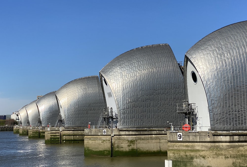 white and gray dome building near body of water during daytime