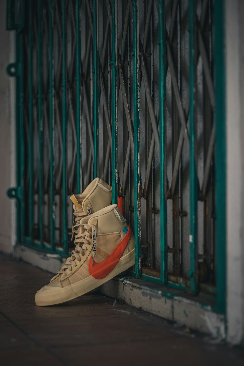 brown and white high top sneakers