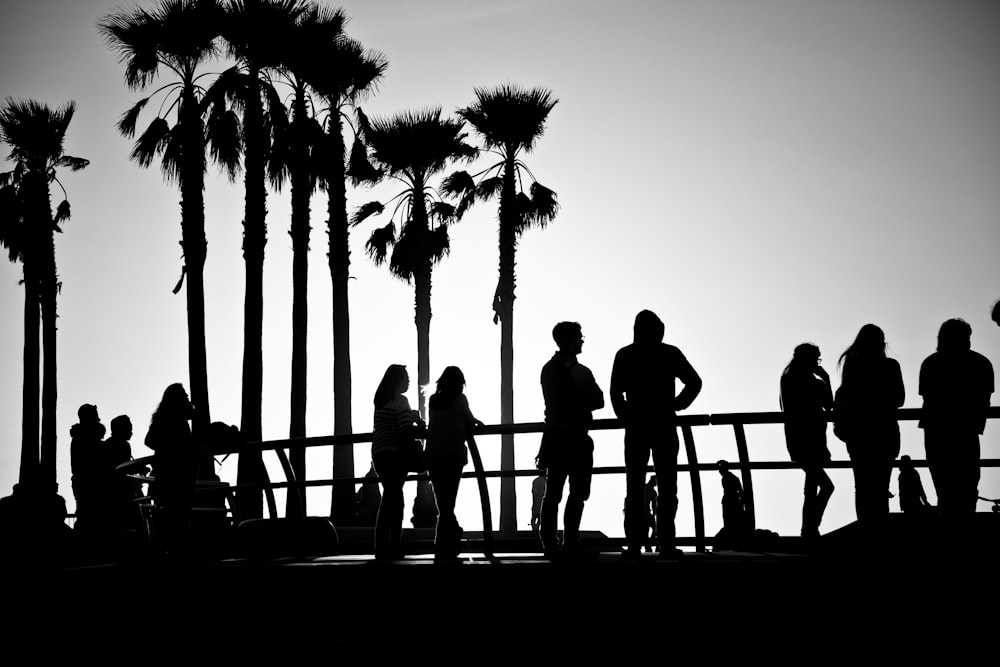 silhouette of people standing on the stairs