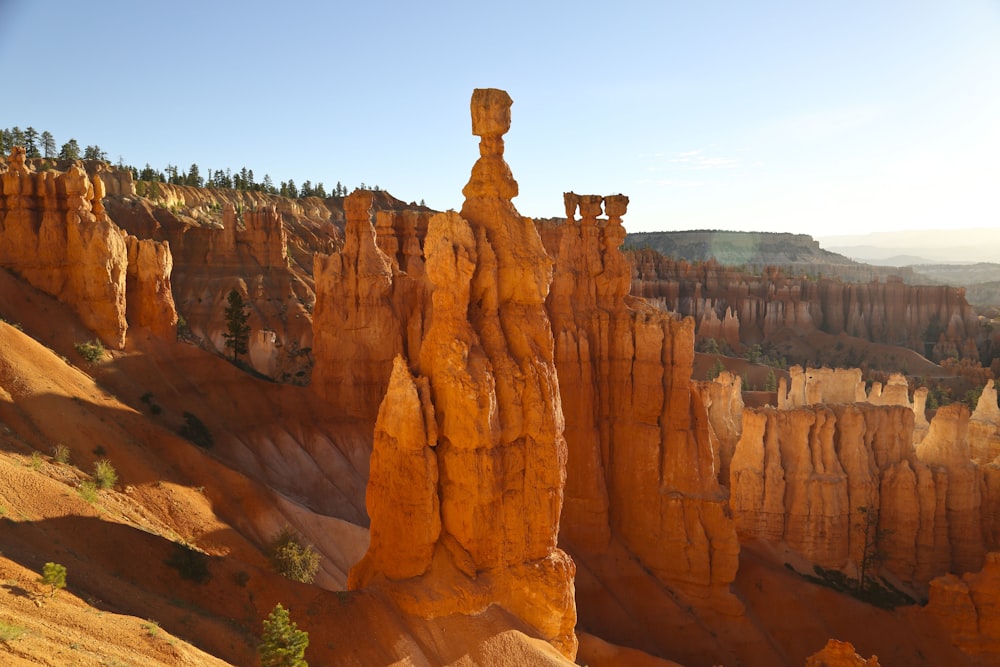 brown rock formation under blue sky during daytime