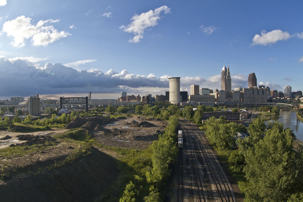 city skyline under blue sky during daytime