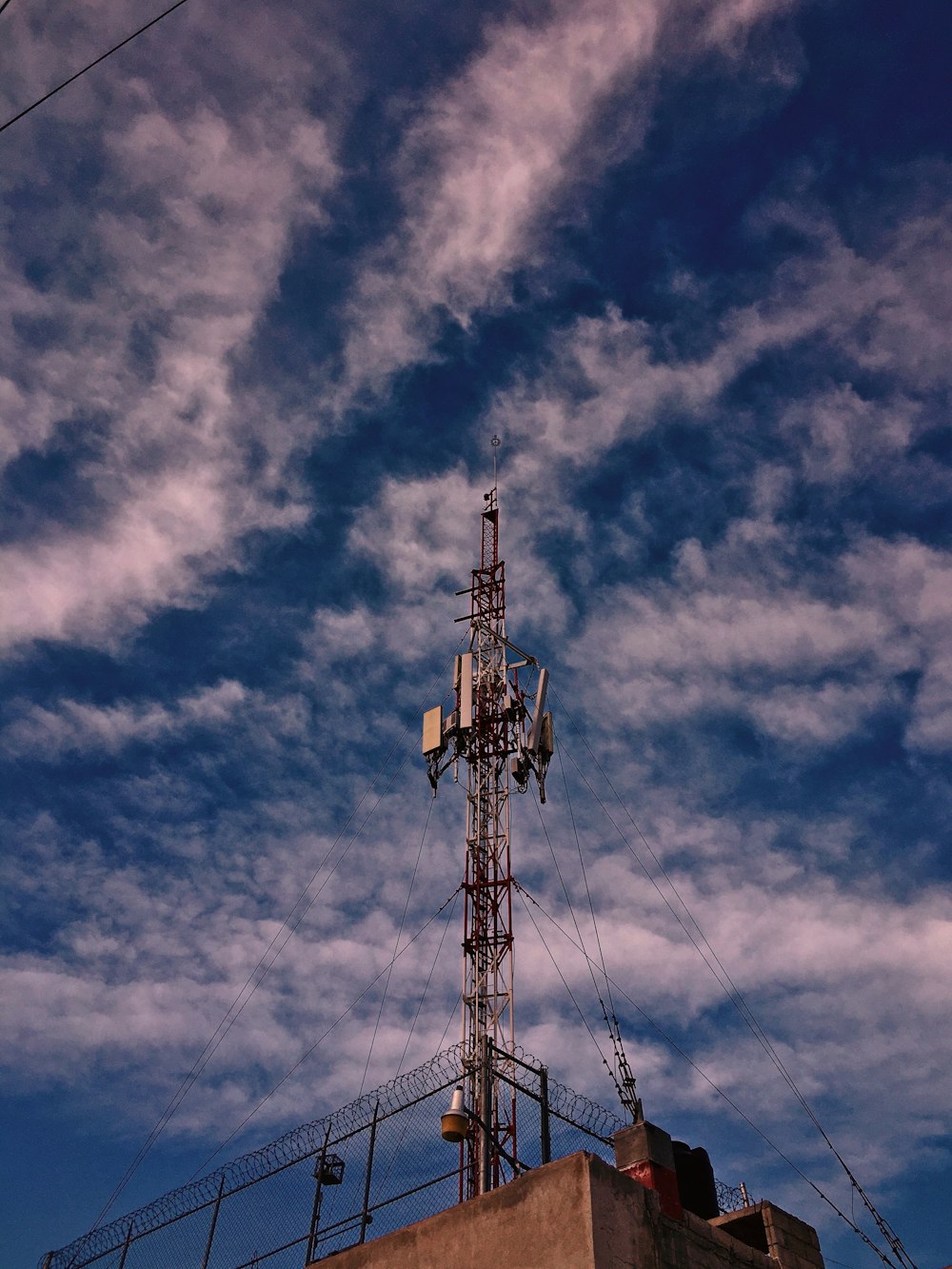 black metal tower under blue sky