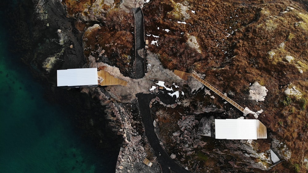 aerial view of white and black boat on water